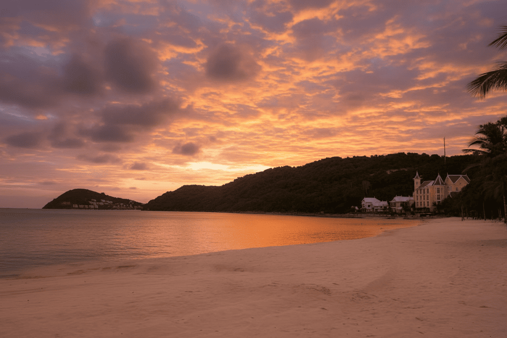 The poetic scenery, curved shoreline, and lush greenery make walking and photo-taking at Khem Beach an unforgettable experience